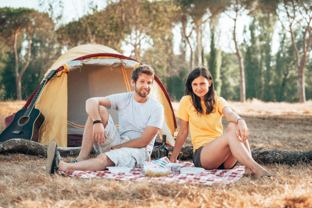 istock happiness friends smiling at the camping 1312923014