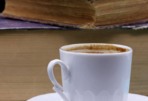 istock a cup of Turkish coffee and old book 1312928613