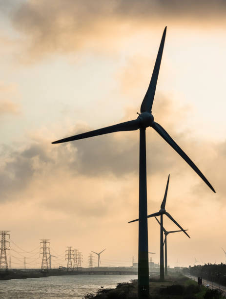 istock Close-up of windmills group with sky background 1312932328
