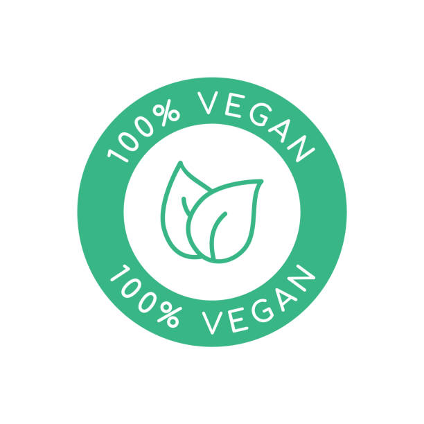 100% vegan sign, icon, logo. Plant based product label. Round green stamp with leaves. Food packaging vegan symbol. Eco friendly healthy diet without animal-derived ingredients. Vector illustration vegan stock illustrations