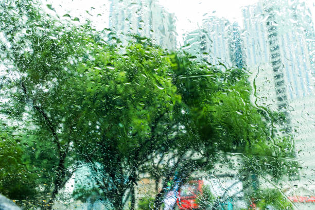 A beautiful view of rain droplets from car window.