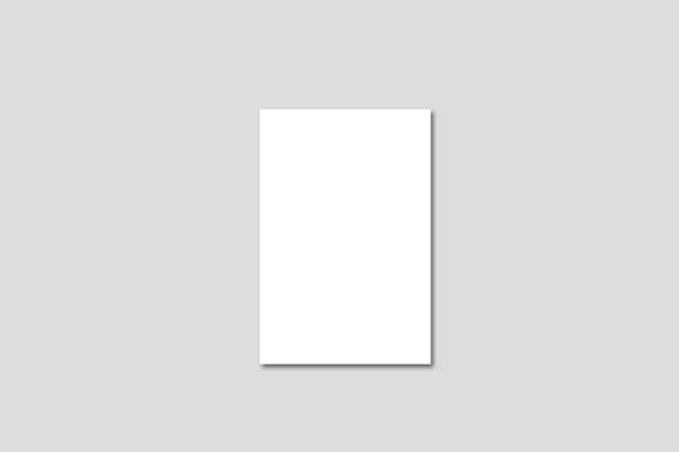 istock One white empty blank card template mock up on grey background. Flat lay, top view. 1312951454