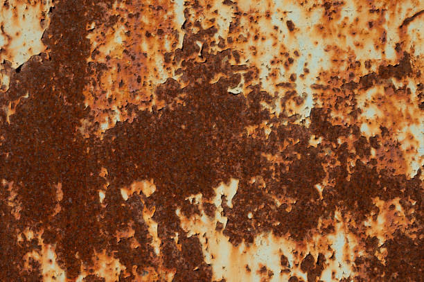 istock Textured grunge background ferruginous red peeling paint with rust on old metal surface 1312951520
