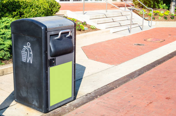 istock Recycling bin on a red-brick pedestrian street 1312954438