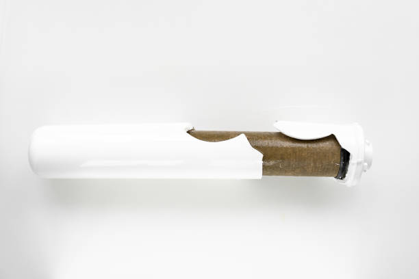 istock Dirty filter cartridge drinking water on a white background. Pollution. 1312957574