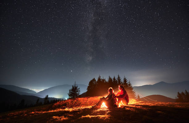 istock Romantic evening outdoors under starry sky in the mountains. 1312962950