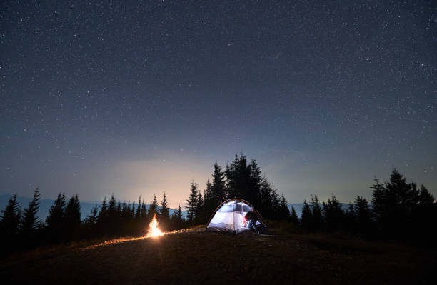 istock Night campsite under stars while beautiful cool weather. 1312962990