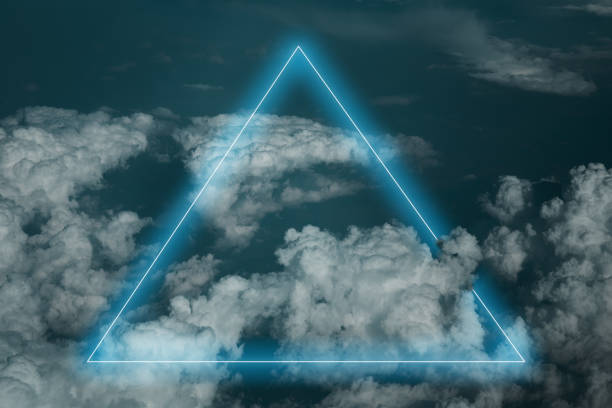 istock Stunning triangle neon geometry shapes above the clouds 1312963876