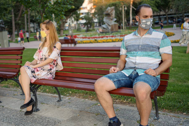 istock A young married couple keeps their distance outdoors 1312965247