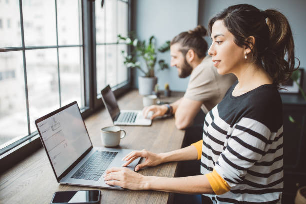 istock Couple coworking at home 1312965430