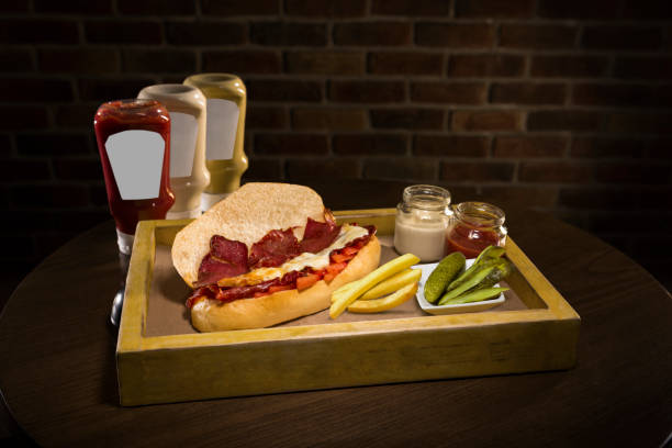 delicious fastfood on wooden background.