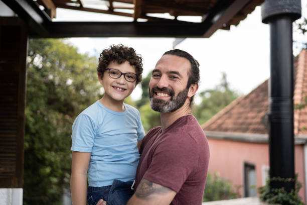 istock Portrait of father and son 1312969801
