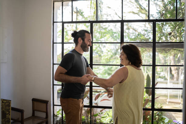 istock Mother and son dancing at home 1312970249