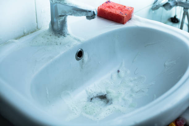 istock home cleaning dirty white ceramic sink with sponge and foam 1312972919