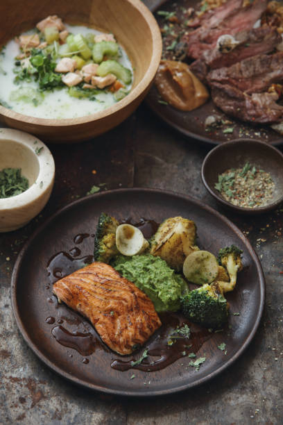 istock Grilled Salmon with Vegetables. Salmon Soup. 1312974865
