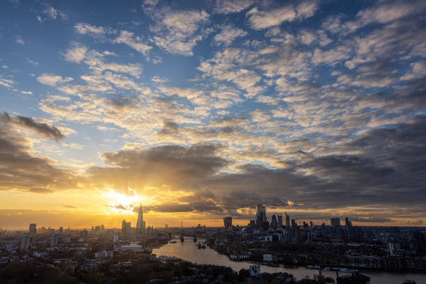 istock Wide panoramic view over the skyline of London during sunset 1312975678