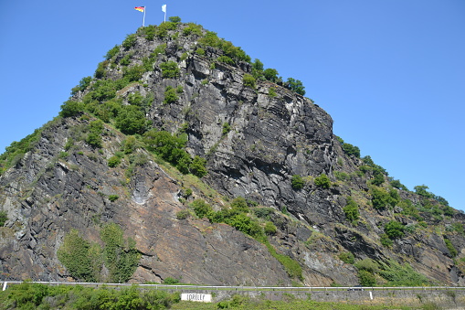 Loreley Gorge Germany May 2016 The Loreley is a  132 m ✓(433 ft) high, steep slate rock on the right bank of the River Rhine in the Rhine Gorge