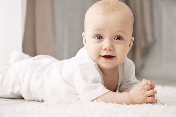 istock Portrait of a crawling baby 1312979437