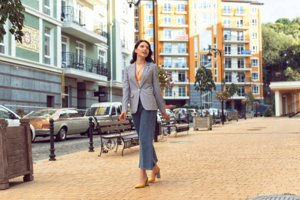 istock Walking with a brunette in a summer city 1312980410