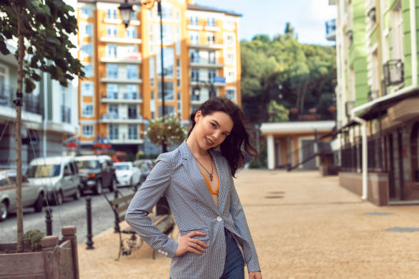 istock Walking with a brunette in a summer city 1312980435