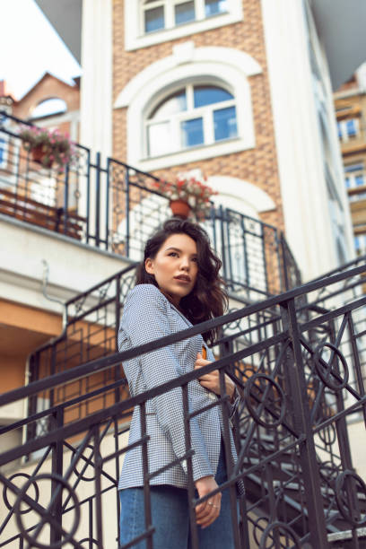 istock Walking with a brunette in a summer city 1312980458