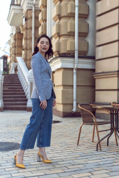 istock Walking with a brunette in a summer city 1312980504