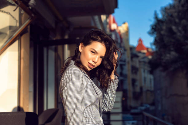 istock Walking with a brunette in a summer city 1312980510