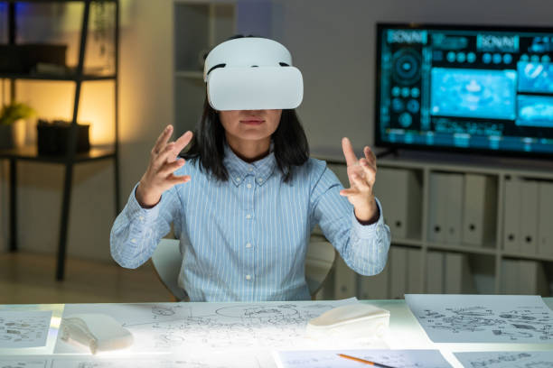 istock Modern Asian designer working in VR goggles 1312980542