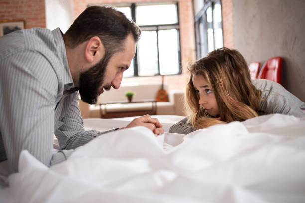 istock Father and daughter looking at each other 1312981314