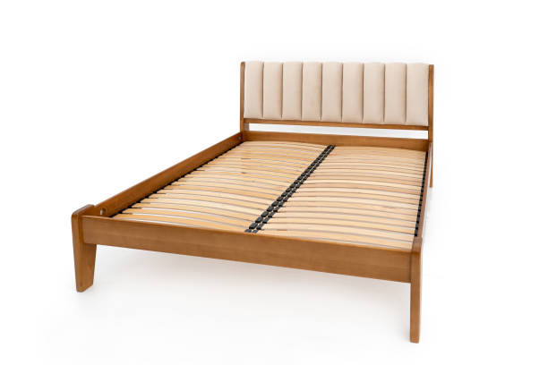 istock brown wooden double bed without mattress isolated on white background 1312983103