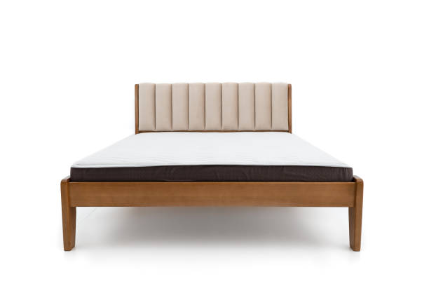 istock brown wooden double bed with mattress isolated on white background 1312983115