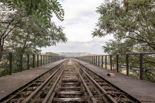istock Railway track on a bridge - landscape 1312985374