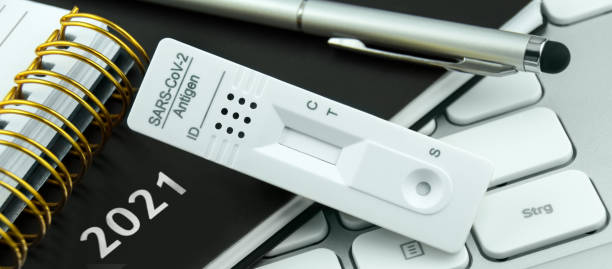 istock Concept Corona Antigen Rapid Test and PC with calendar 2021 1312988053