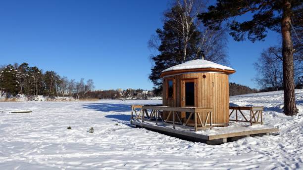 The sauna cabin is ready by the frozen lake The sauna cabin is ready by the frozen lake in northern Europe swedish sauna stock pictures, royalty-free photos & images