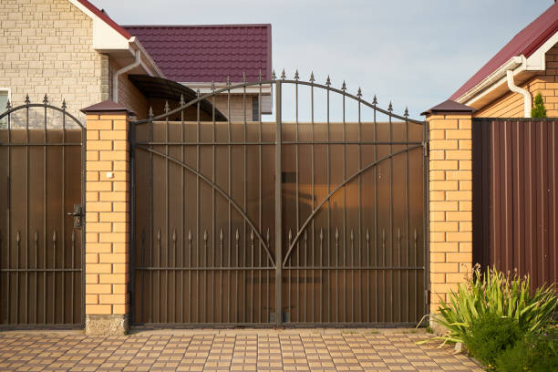 istock Metal forged gate for entering a private house 1312992166