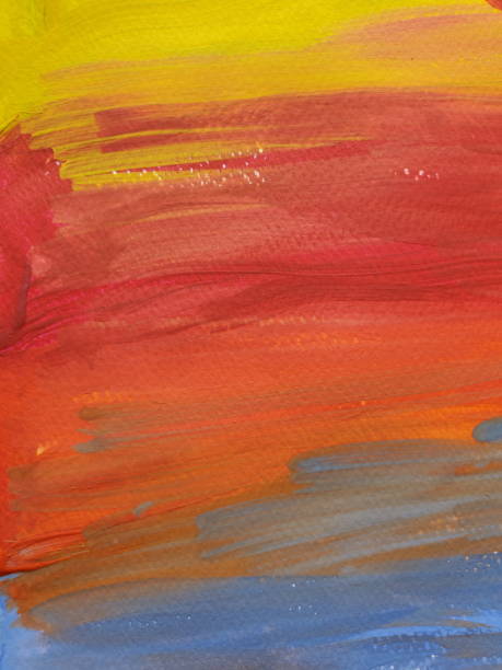 Colorful paint texture of kids painting looks like rainbow or sunset sky stock photo