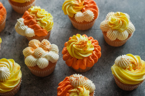 istock Delicious muffins. Orange and lemon cream muffins 1312997617