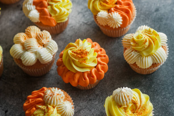 istock Delicious muffins. Orange and lemon cream muffins 1312997711