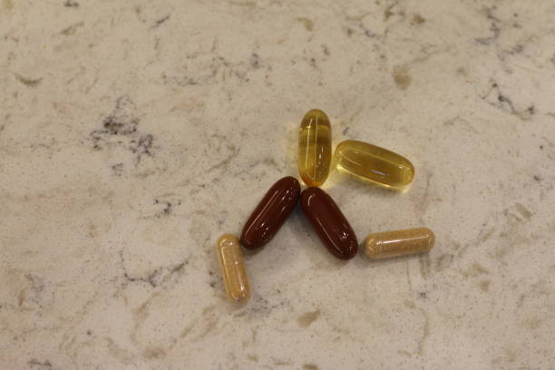 widok z góry witamin i suplementów pigułki - vitamin pill capsule pill echinacea zdjęcia i obrazy z banku zdjęć