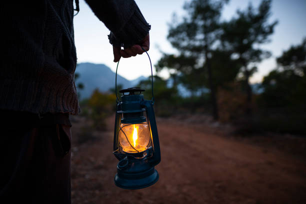 istock stroll through the woods with a kerosene lamp. 1313008146