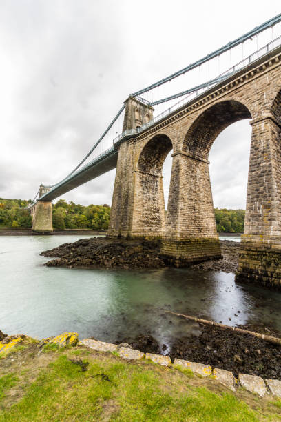 istock Menai Bridge between Snowdonia and Anglesey, portrait. 1313009034