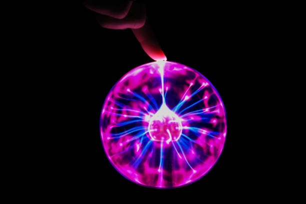 istock Magic ball with lightning on a black isolated background 1313009265