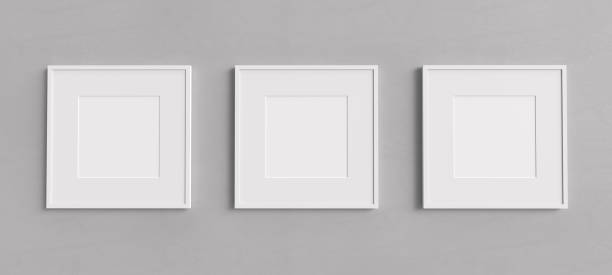 Three white square shape picture frames mockup Three empty white picture frames with square shape on a grey wall. Blank Mockup for images and photos. square shape photos stock pictures, royalty-free photos & images