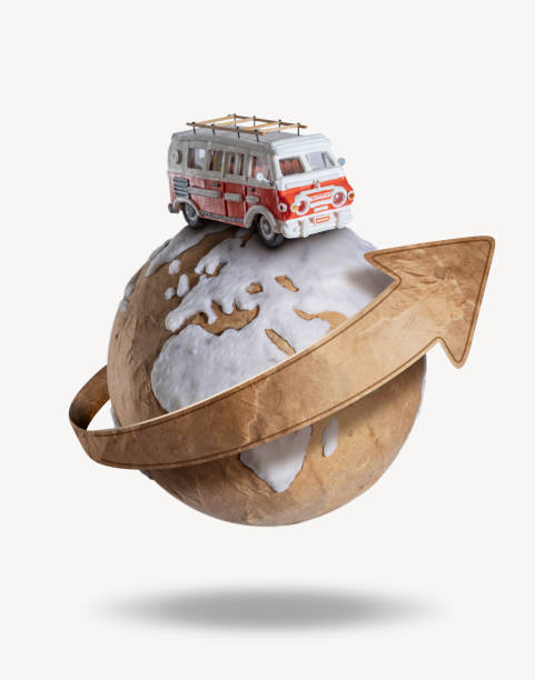 istock Motor home camper driving on the earth globe on vacations with arrow showing the direction 1313013653