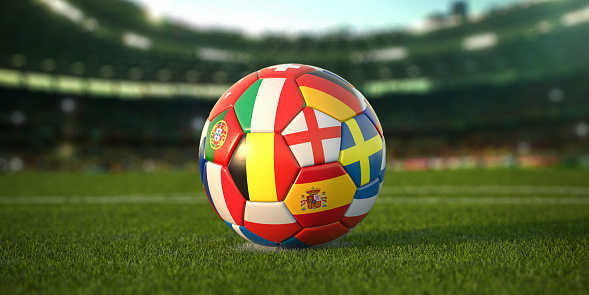 Soccer Football ball with flags of european countries on the grass of football stadium. Euro championship 2021. 3d illustration