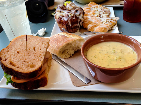 Brocolli and cheese soup, two patries and a ham on lettuce sandwich