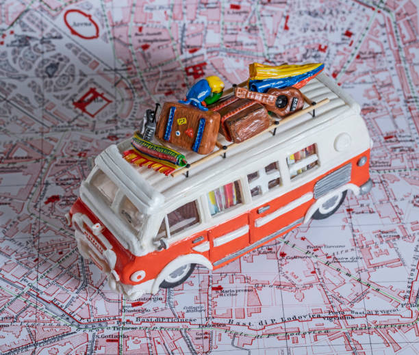 istock Motor home camper driving on street map on vacations 1313017524