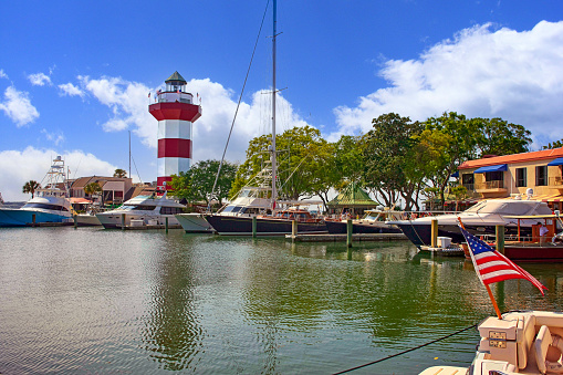 The red and white striped Harbor Town Lighthouse at Hilton Head SC