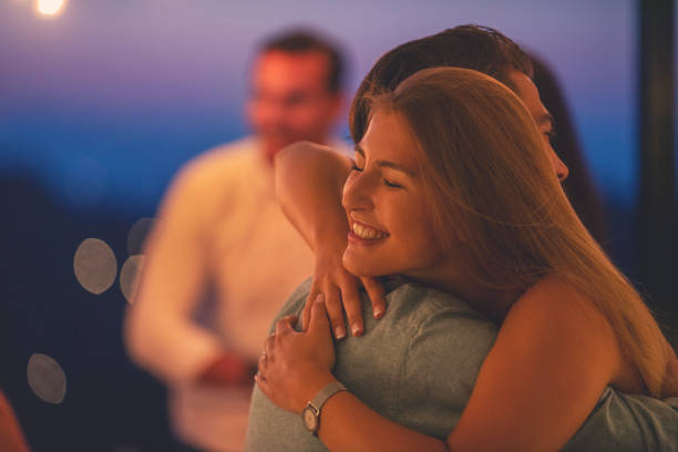 istock Couple embracing at dusk. They are very happy and affectionate. 1313020554