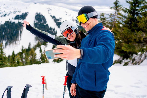 istock Ski couple taking selfie 1313023613